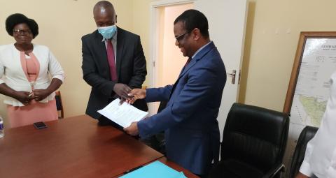 Empower Bank head of business development Mr Enodious Makiwa and ZFU secretary general, Mr Paul Zakariya at the signing ceremony