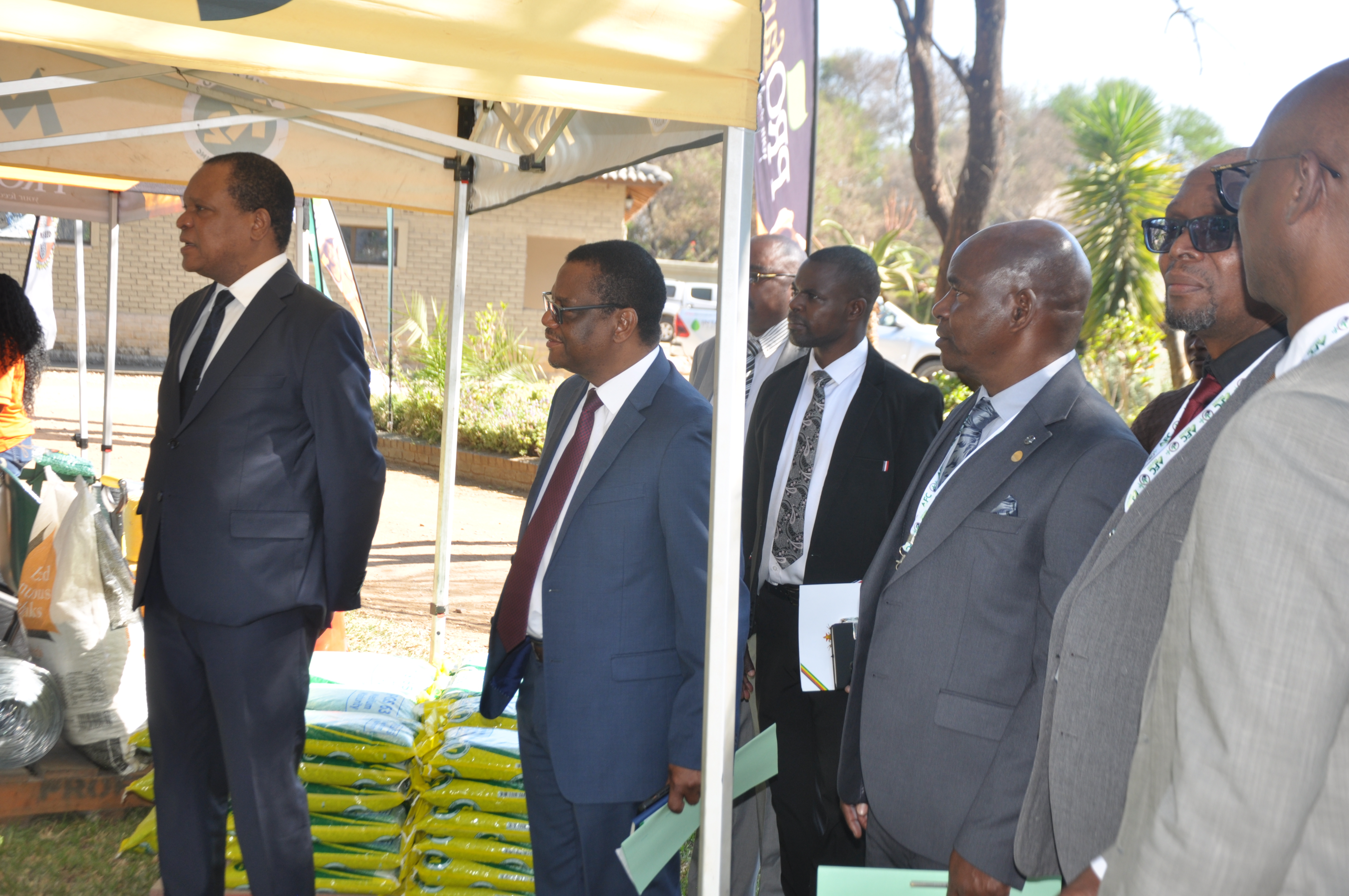 Minister Touring stands